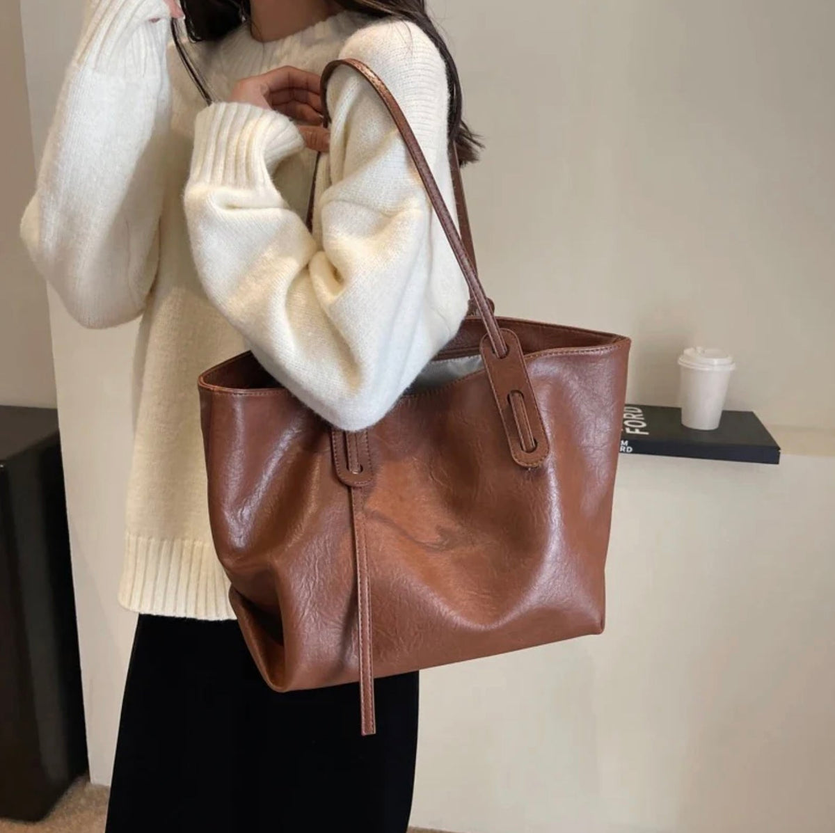Women's black leather handbag with adjustable shoulder strap – Elegant and spacious, Solene model