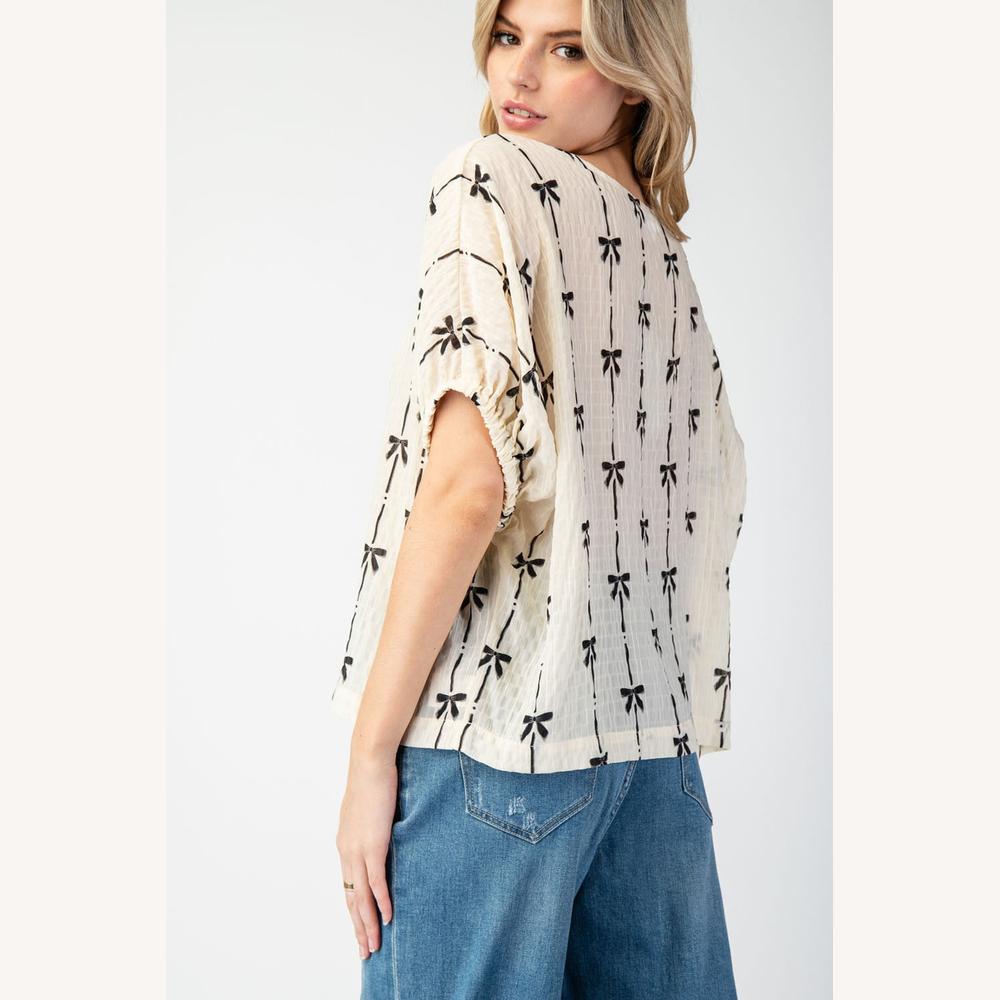 Blouse texturée beige pour femme avec nœuds noirs – Haut léger en coton, manches élastiquées, style décontracté