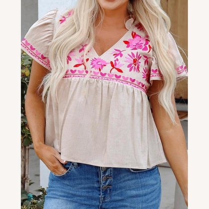 Blouse beige clair pour femme avec broderie florale rose, col en V, tissu respirant – Idéale pour les journées ensoleillées