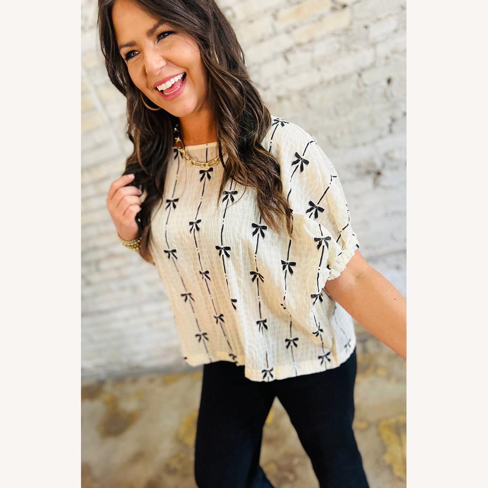 Blouse texturée beige pour femme avec nœuds noirs – Haut léger en coton, manches élastiquées, style décontracté
