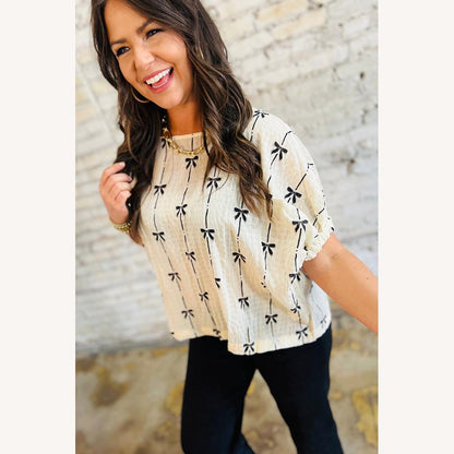 Blouse texturée beige pour femme avec nœuds noirs – Haut léger en coton, manches élastiquées, style décontracté