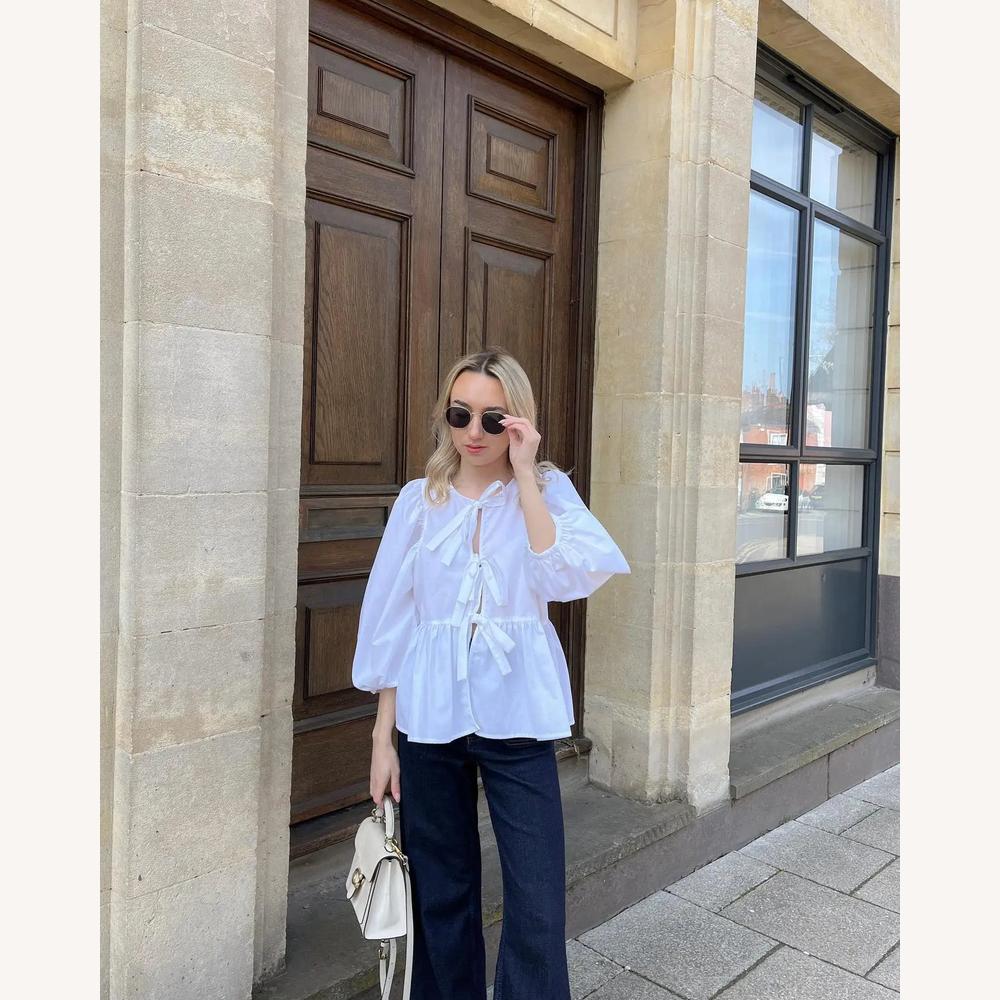 Blouse nouée féminine en coton léger avec manches bouffantes – Col en V élégant et coupe ample