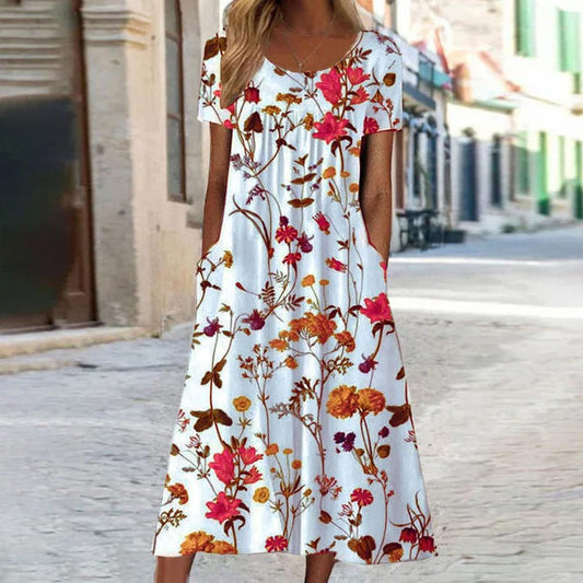 https://cdn.shopify.com/s/files/1/0760/7087/9498/files/Boheemse-Plant-Bloemenprint-Jurk-Dames-Zomer-Comfortabele-Losse-Pullover-Jurk-Met-Korte-Mouwen-Voor-Dames_96a8c0b2-a13f-4e27-966e-08e136f3a6ae.jpg?v=1718429616