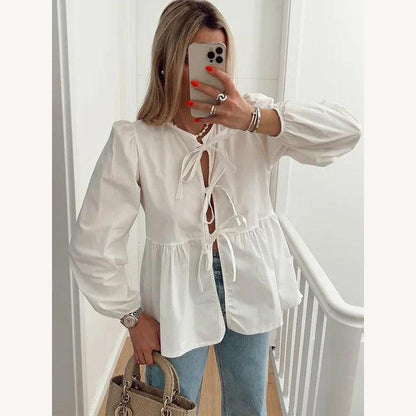 Blouse nouée féminine en coton léger avec manches bouffantes – Col en V élégant et coupe ample