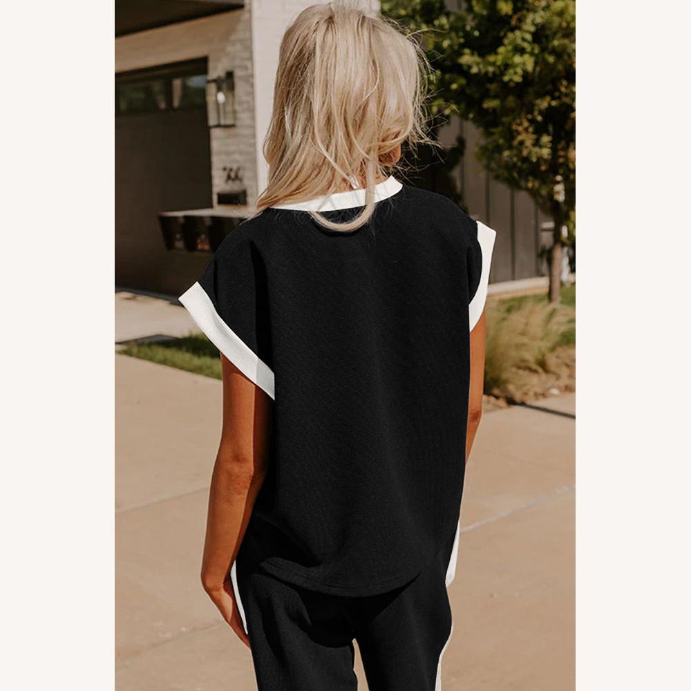 Ensemble deux pièces pour femme noir avec haut ample et pantalon à jambes larges – Détails contrastants blancs