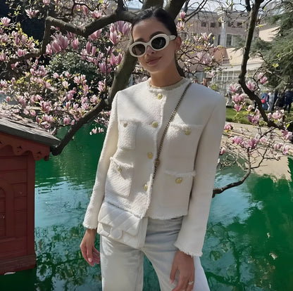 Veste élégante pour femme avec boutons dorés