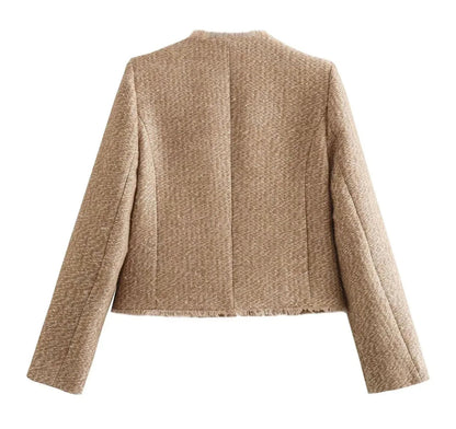 Veste élégante pour femme avec boutons dorés