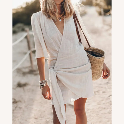 https://cdn.shopify.com/s/files/1/0760/7087/9498/files/mikuta-light-wrap-dress-2861_1800x1800_5240ca35-f6a4-40b1-9012-7f5f2c32e081.webp?v=1720652302
