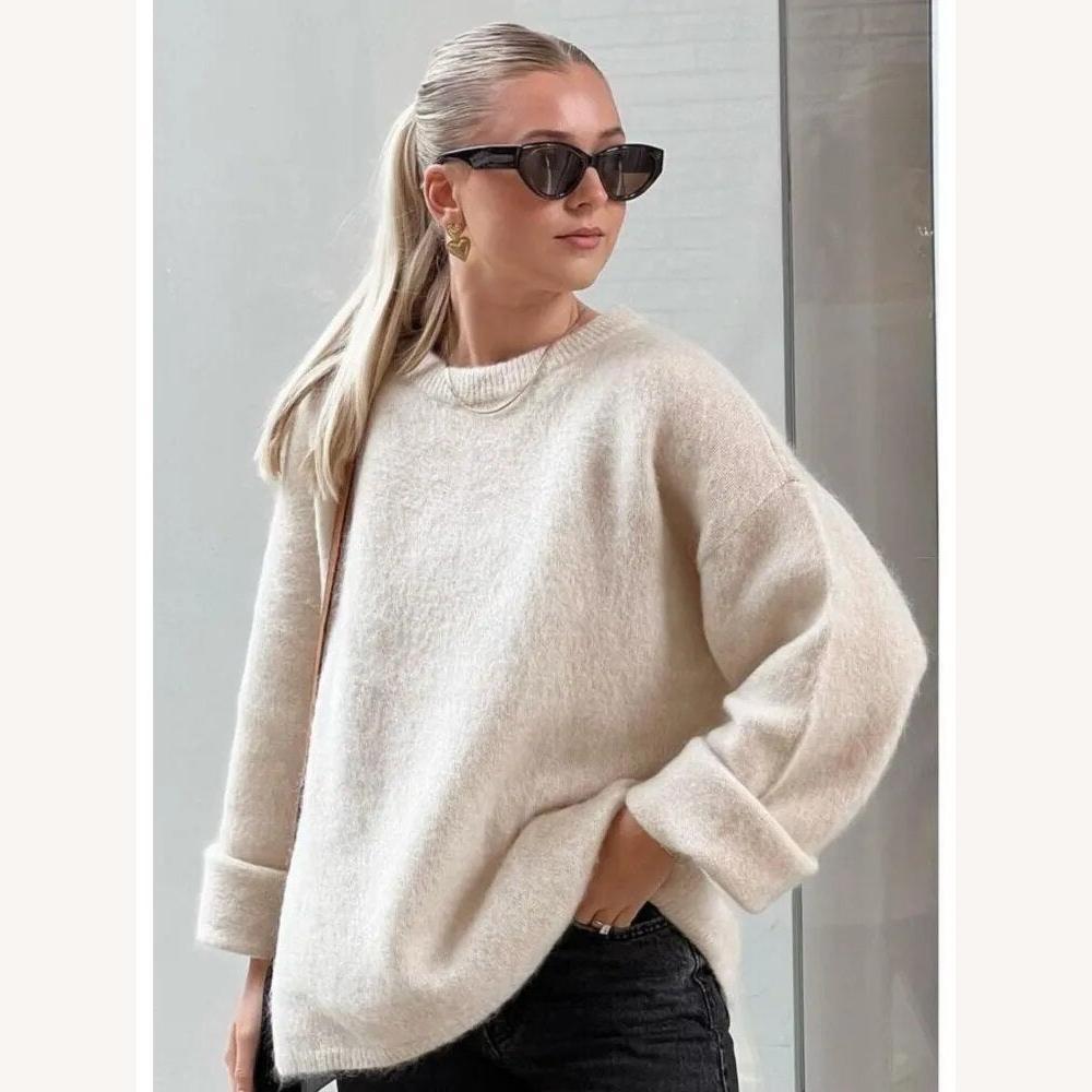 Pull tricoté doux pour femme, coupe ample – col rond, confortable et élégant pour un look décontracté
